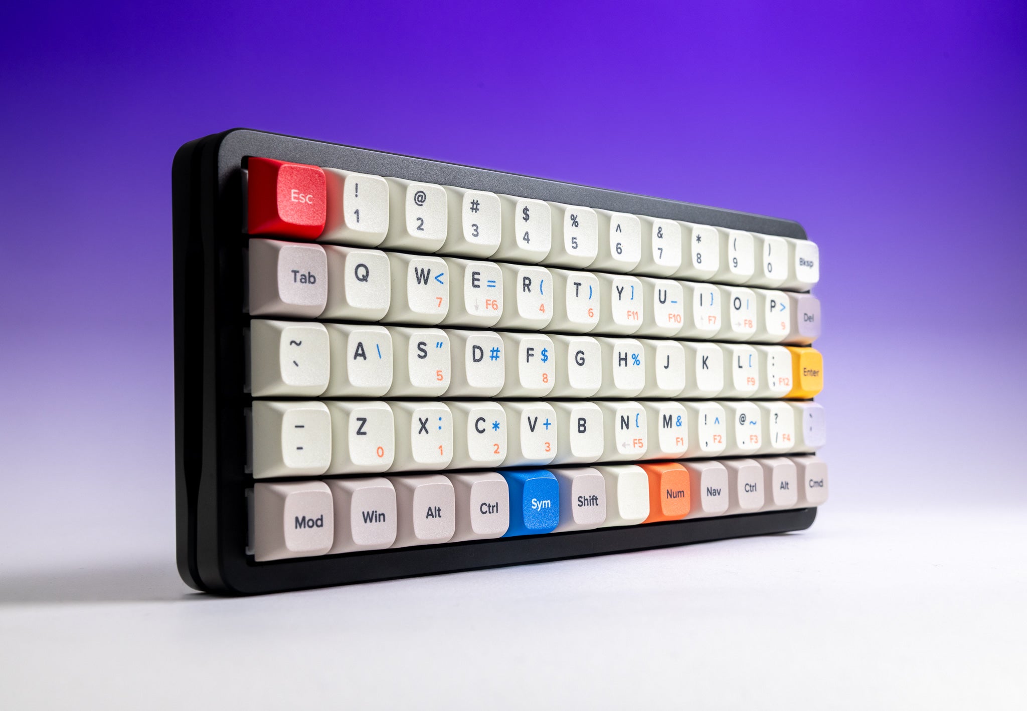 Preonic Rev 4 at an angle, showing the anodized aluminum case profile and QWERTY keycaps