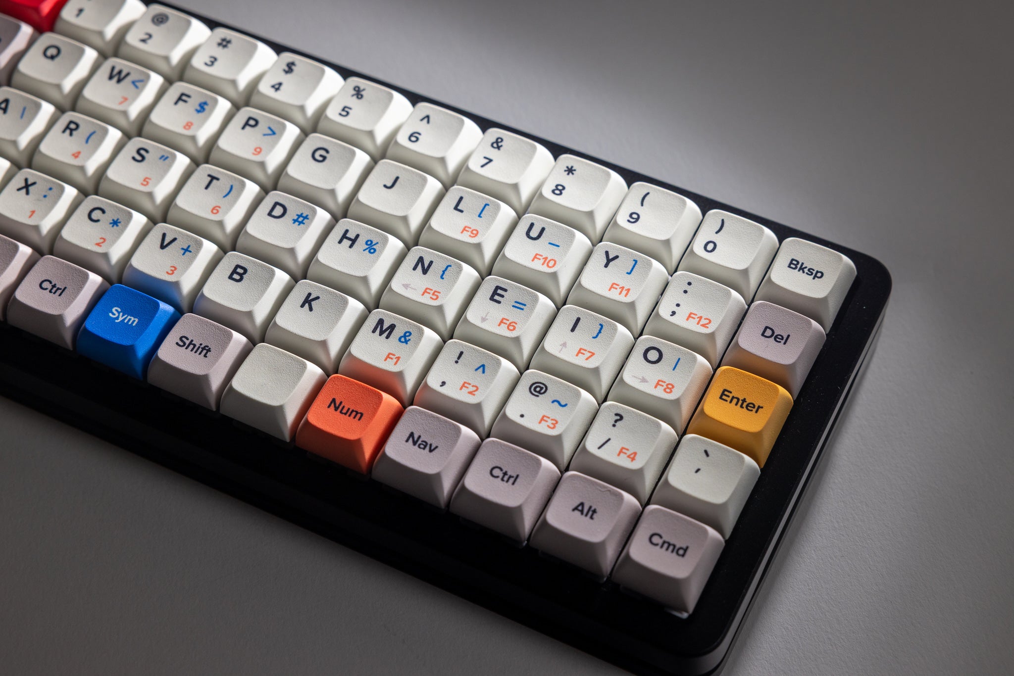 Close-up of the Preonic Rev 4 bottom row and modifier keycaps